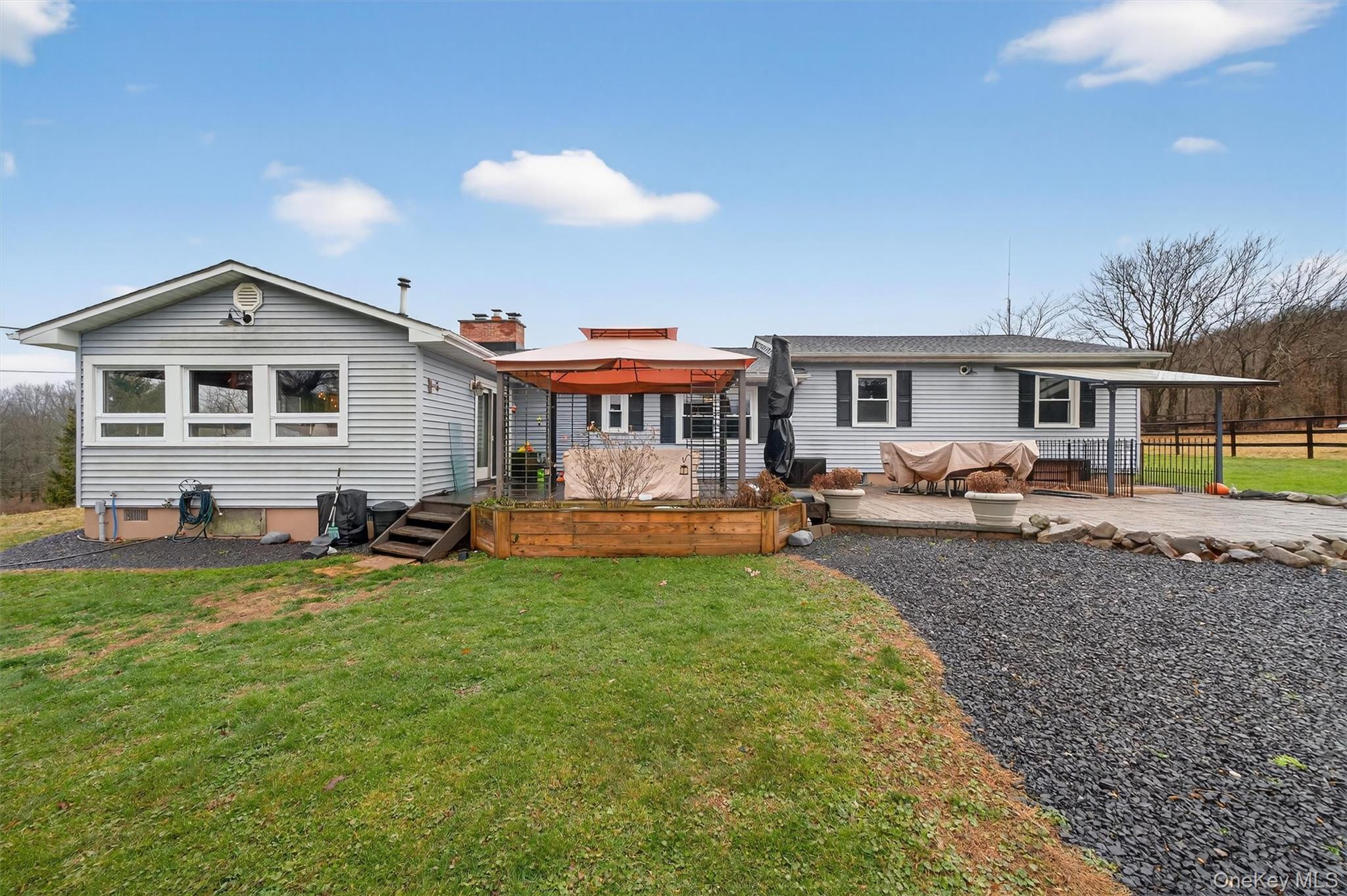 65 Bailey Road New Hampton, NY 10958 - Photo 47 of 50 a view of a house with a yard patio and a patio