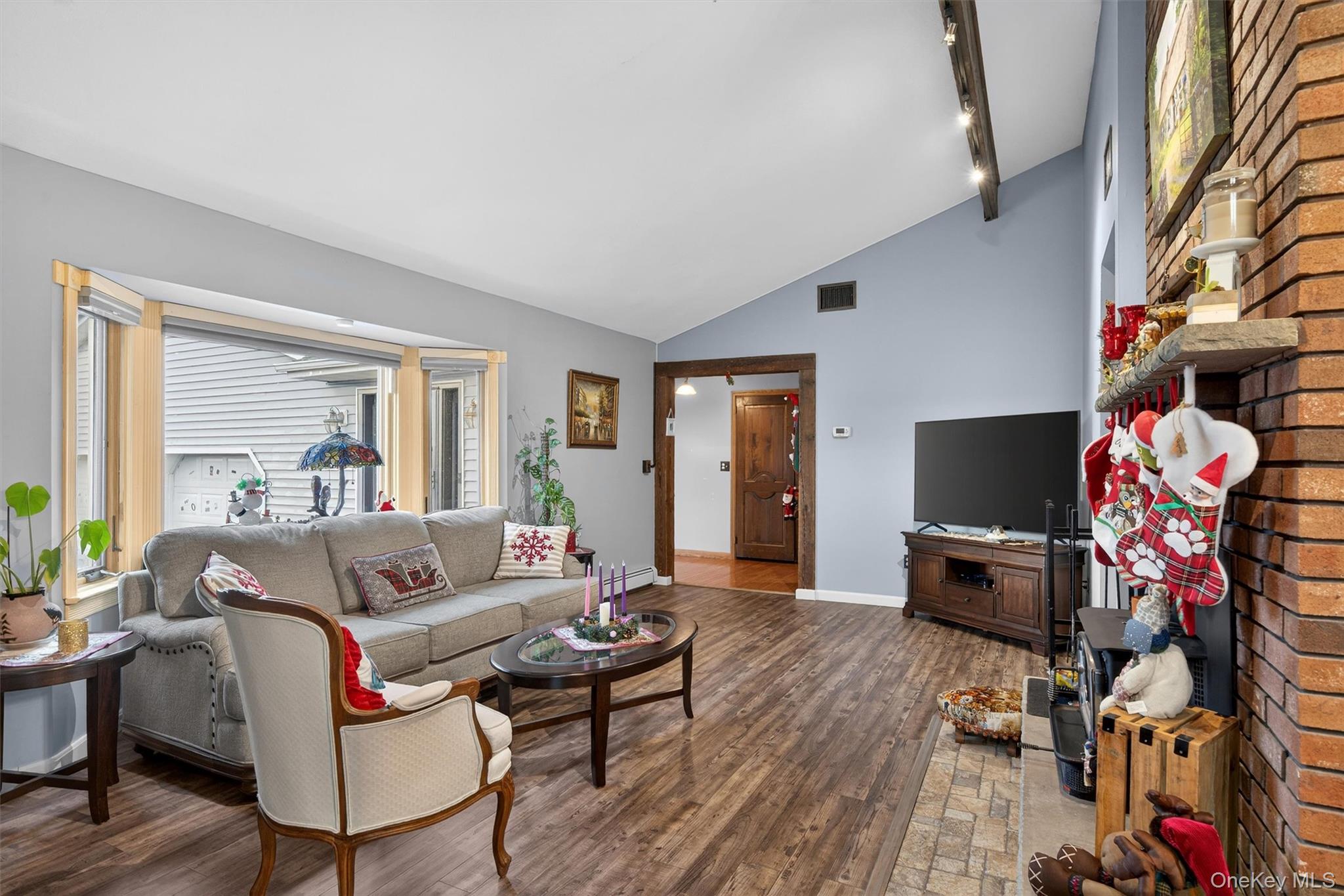65 Bailey Road New Hampton, NY 10958 - Photo 9 of 50 a living room with furniture and a flat screen tv