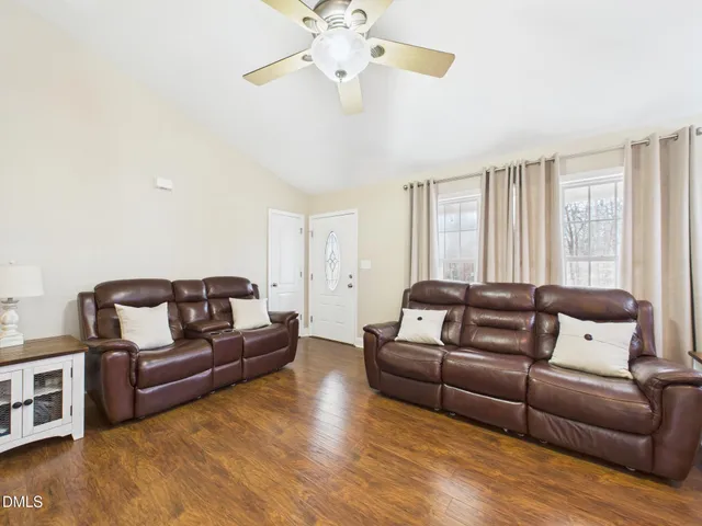 a view of swimming pool with a backyard