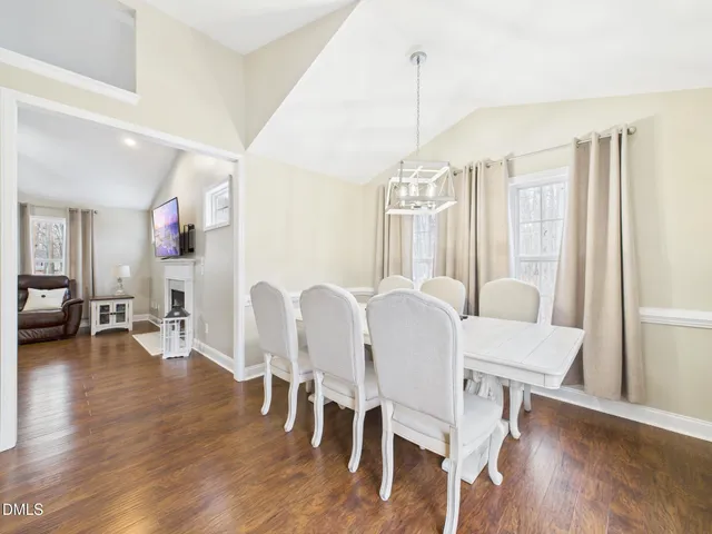 a view of a park with large trees