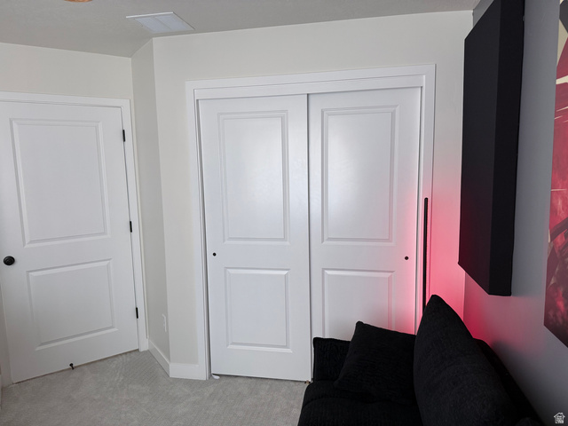 774 West 480 South American Fork, UT 84003 - Photo 57 of 76 White paneled doors with black hardware, complementing the light-colored walls and soft gray carpeting
