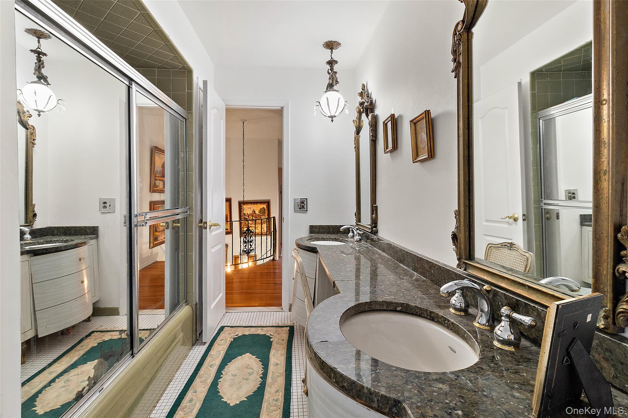 20 Old Farm Road Scarsdale, NY 10583 - Photo 29 of 40 a en suite bathroom with a granite countertop sink and a mirror