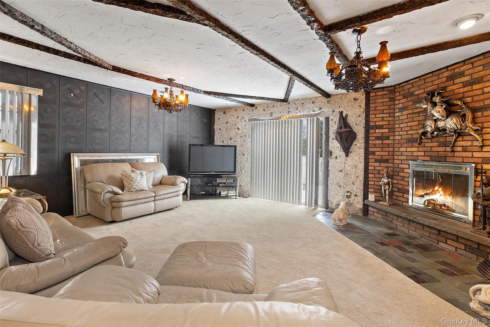 20 Old Farm Road Scarsdale, NY 10583 - Photo 31 of 40 a living room with furniture and a fireplace