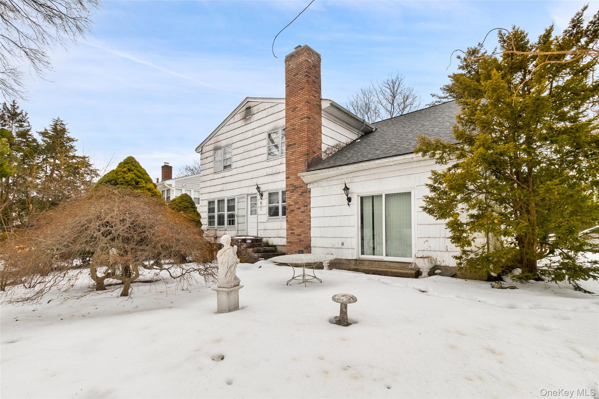 20 Old Farm Road Scarsdale, NY 10583 - Photo 39 of 40 a view of a house with a snow in the yard