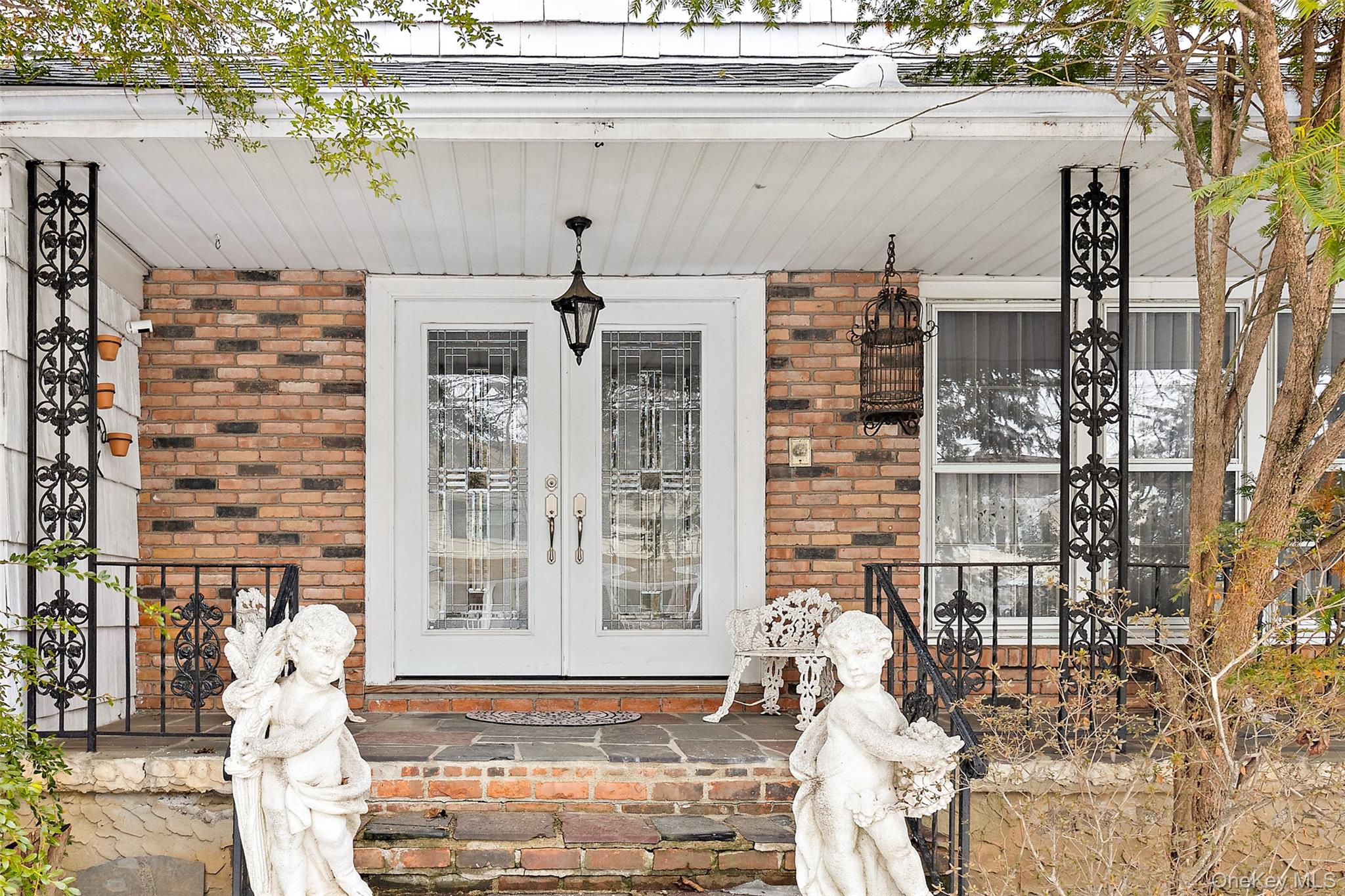 20 Old Farm Road Scarsdale, NY 10583 - Photo 40 of 40 a front view of a building with large windows