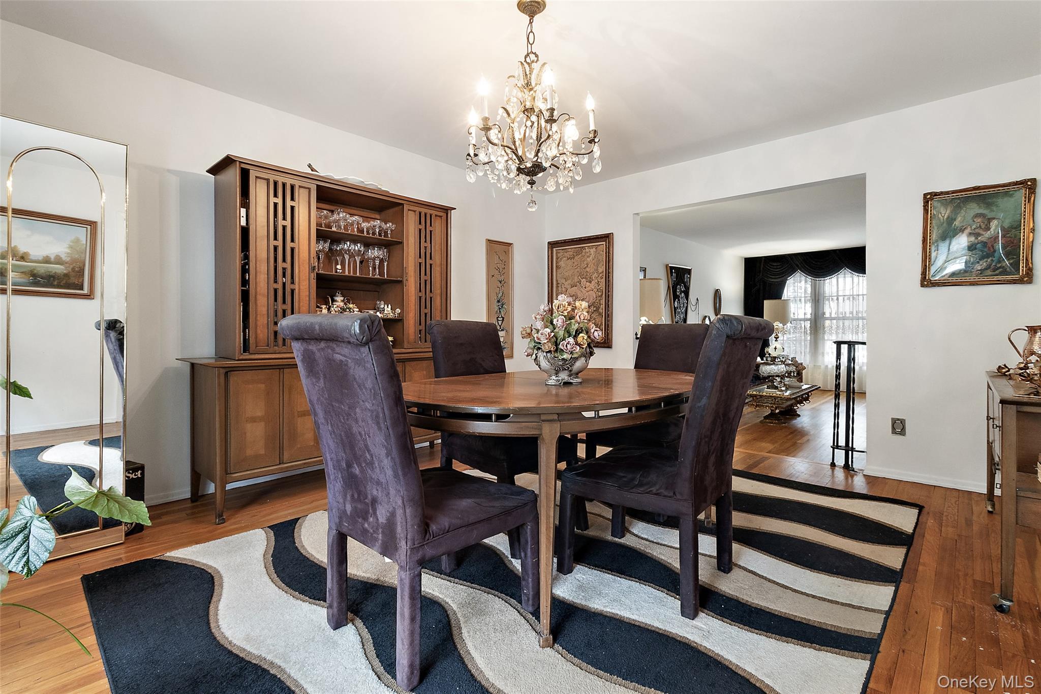 20 Old Farm Road Scarsdale, NY 10583 - Photo 8 of 40 a view of a dining room with furniture window and wooden floor