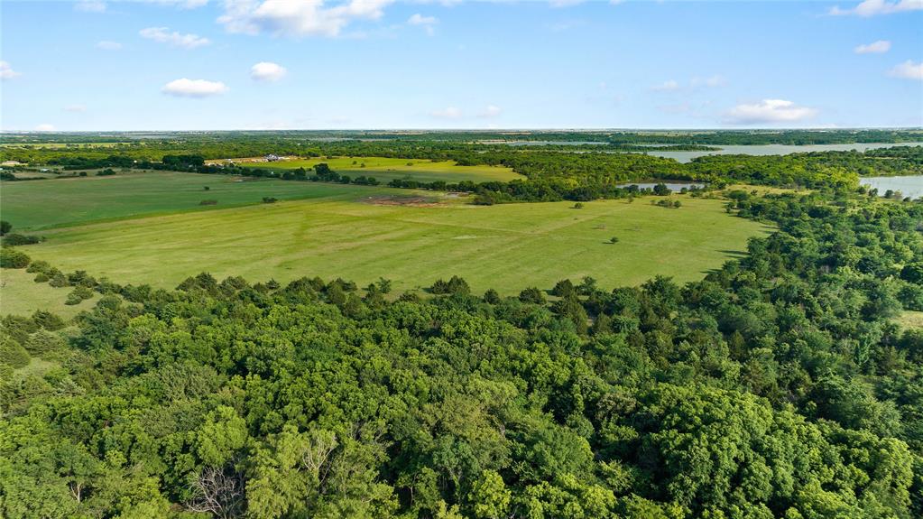0 West Hinton Street Tioga, TX 76271 - Photo 4 of 8 a view of a city and an ocean view
