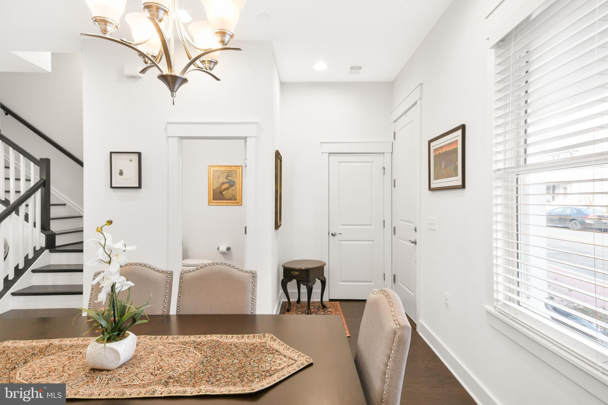 224 East 6th Street Frederick, MD 21701 - Photo 11 of 55 a living room with furniture and a wooden floor