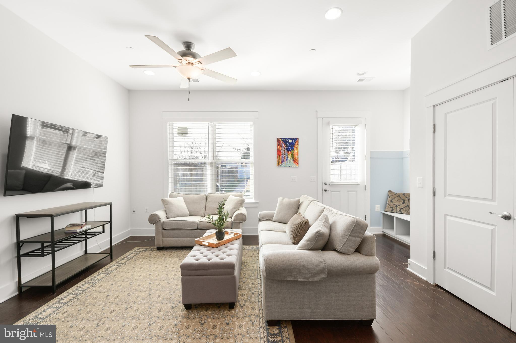 224 East 6th Street Frederick, MD 21701 - Photo 25 of 55 a living room with furniture and a window