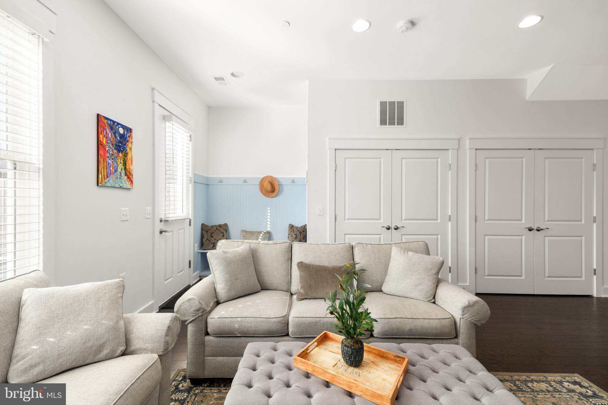 224 East 6th Street Frederick, MD 21701 - Photo 26 of 55 a living room with furniture and wooden floor