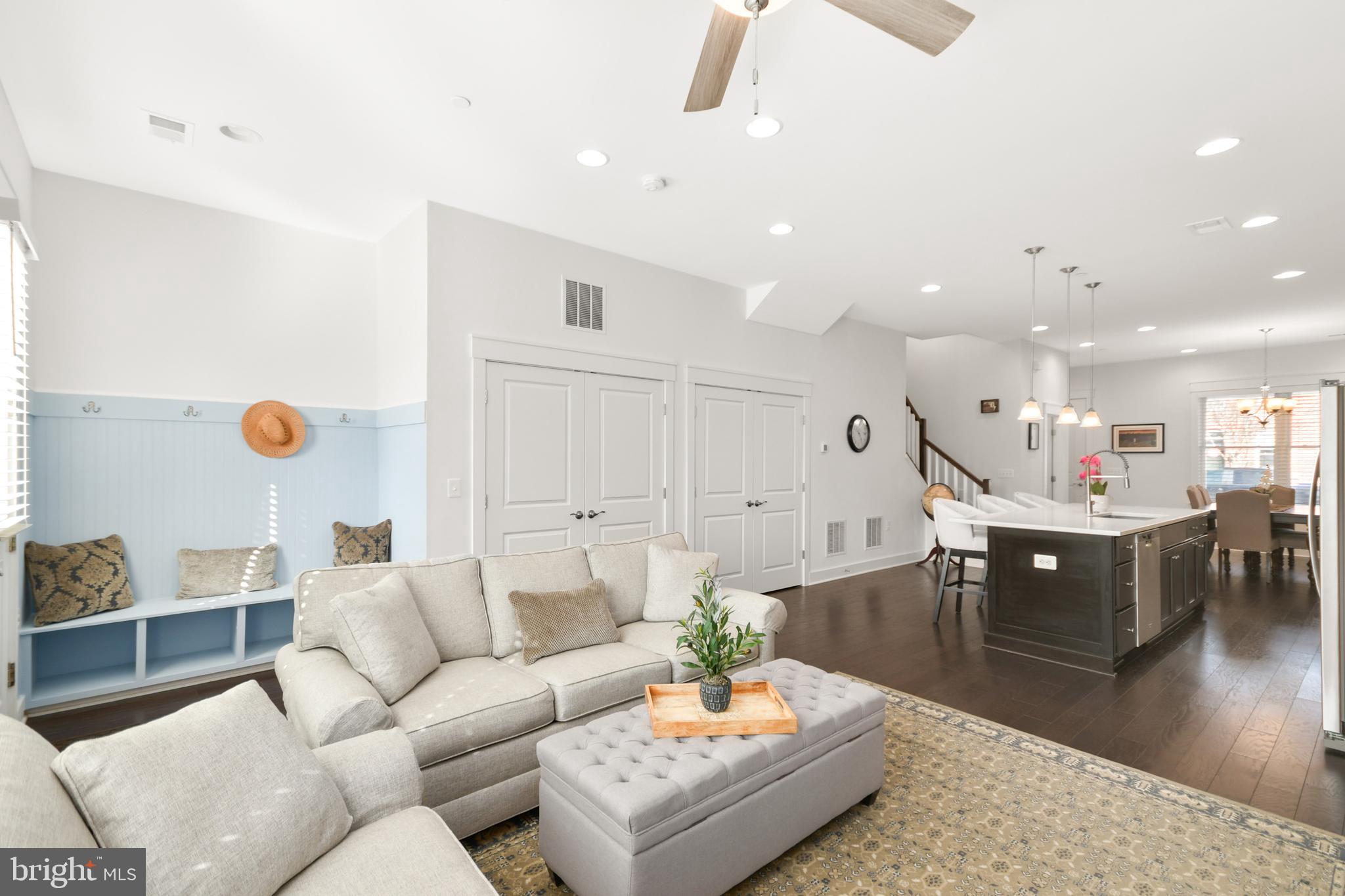 224 East 6th Street Frederick, MD 21701 - Photo 27 of 55 a living room with furniture kitchen view and a wooden floor