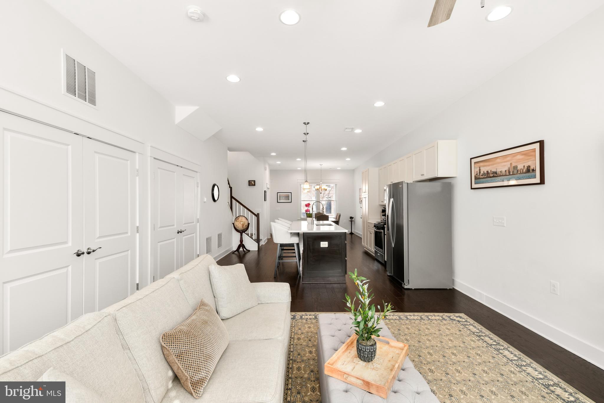 224 East 6th Street Frederick, MD 21701 - Photo 28 of 55 a living room with furniture and a rug