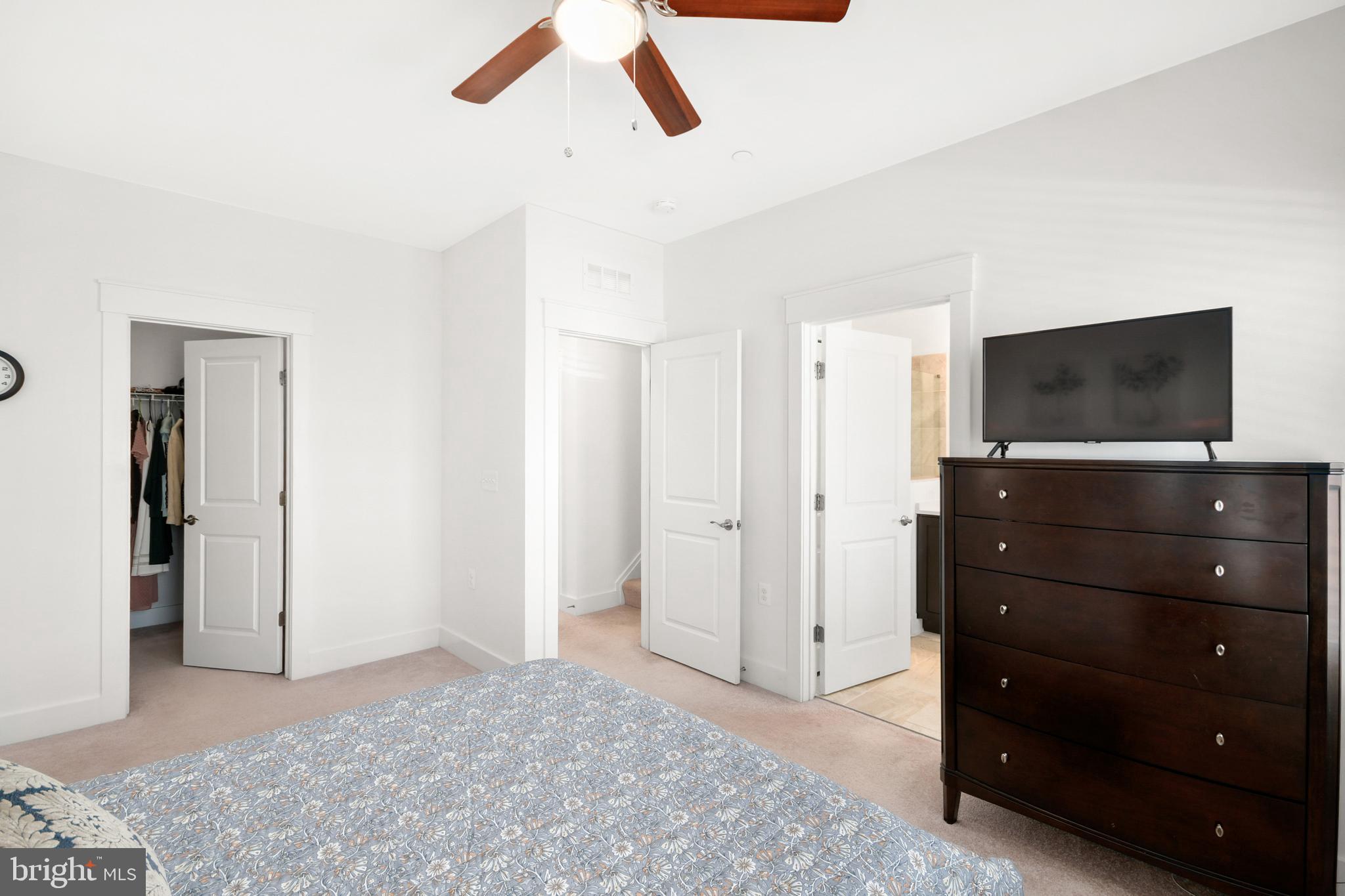 224 East 6th Street Frederick, MD 21701 - Photo 34 of 55 a bedroom with a bed and a flat screen tv