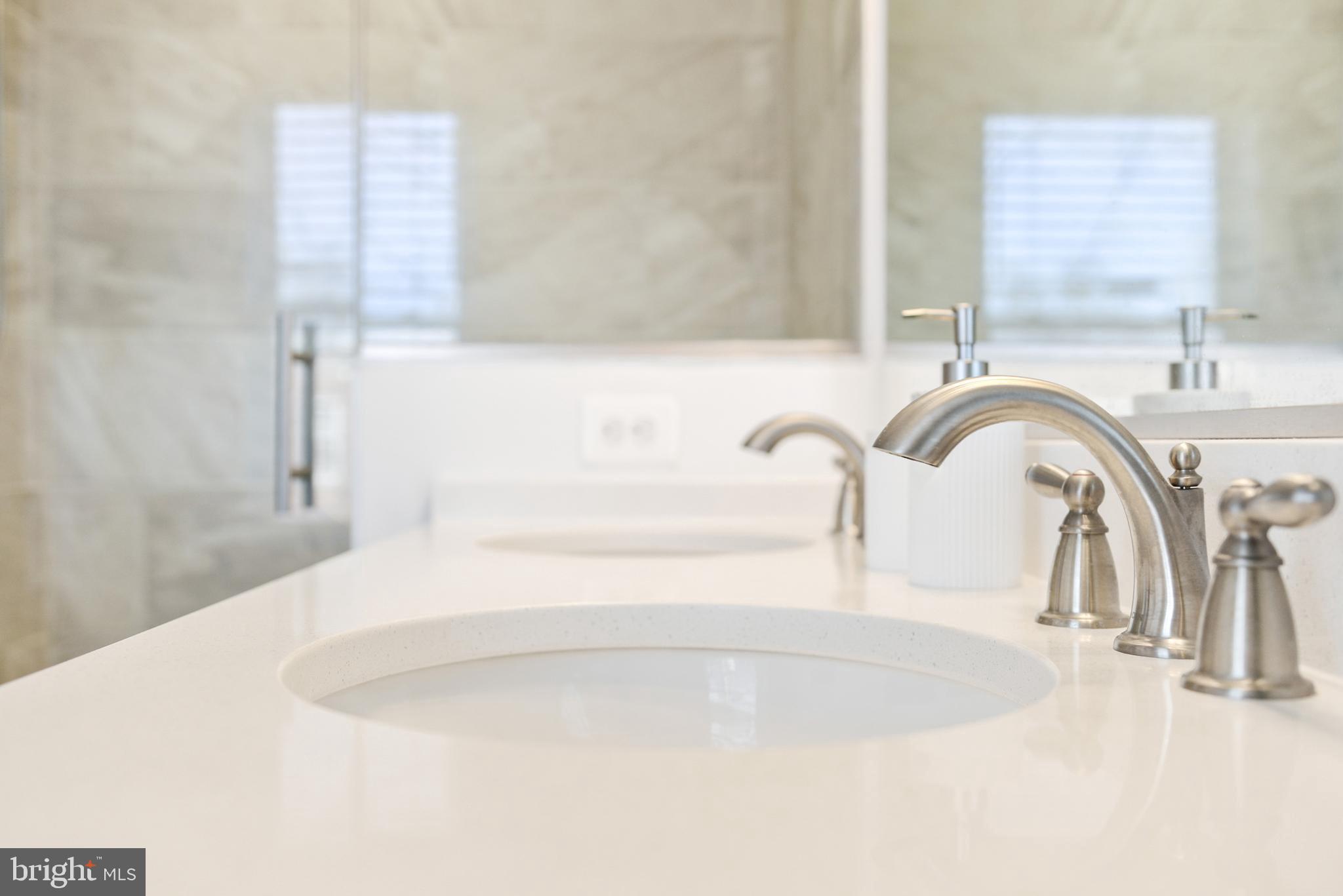 224 East 6th Street Frederick, MD 21701 - Photo 36 of 55 a bathroom with a bathtub and a sink