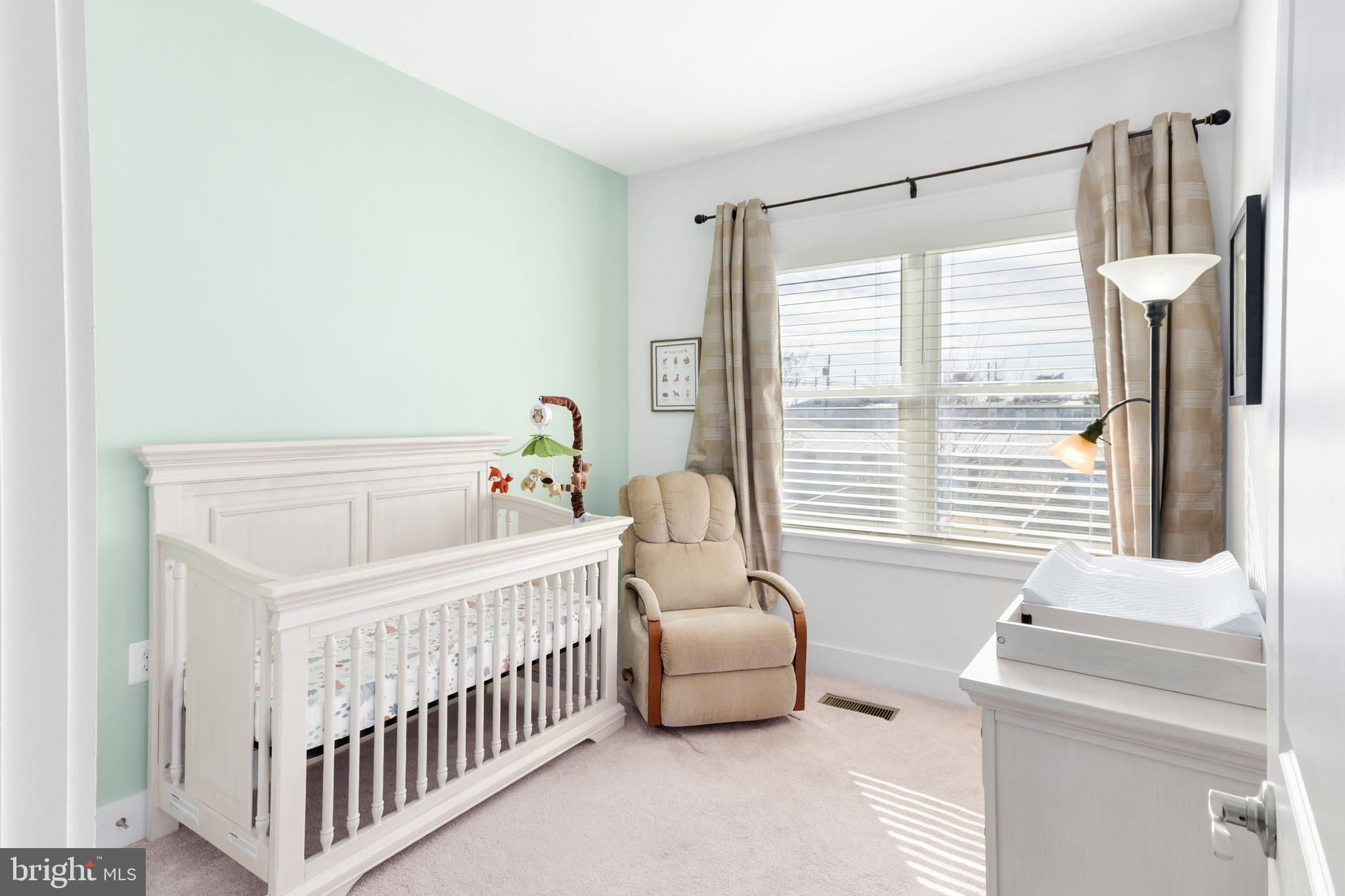 224 East 6th Street Frederick, MD 21701 - Photo 39 of 55 a bedroom with furniture and a window