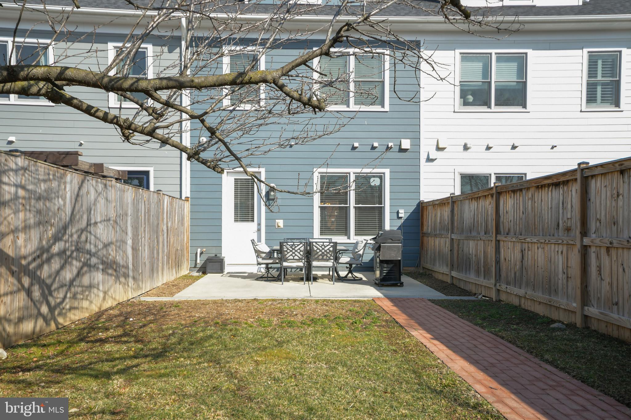 224 East 6th Street Frederick, MD 21701 - Photo 50 of 55 a front view of a house with a garden
