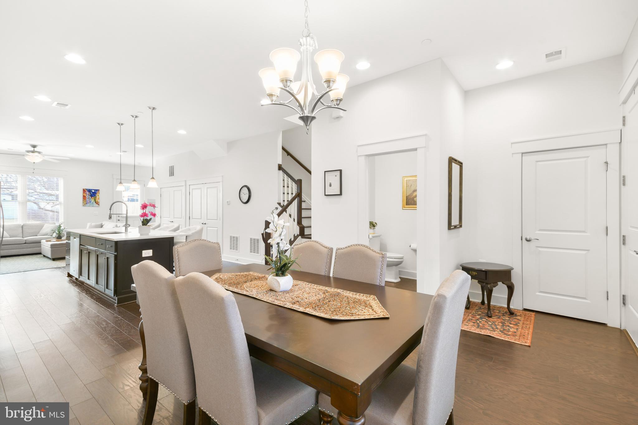 224 East 6th Street Frederick, MD 21701 - Photo 10 of 55 a view of a dining room with furniture and wooden floor