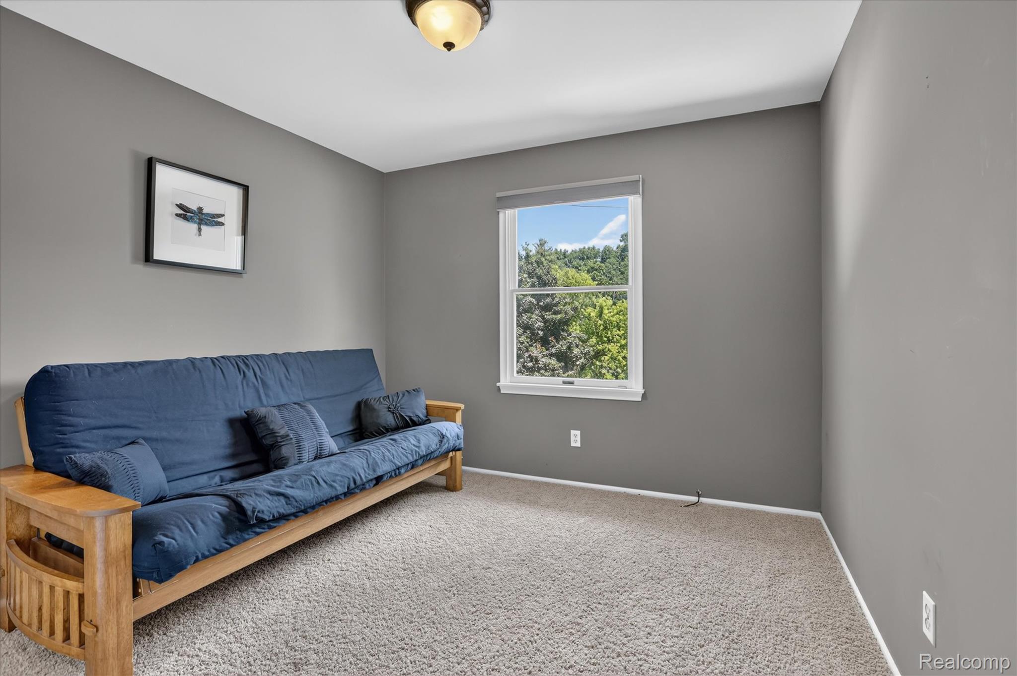 7186 East River Road Flushing, MI 48433 - Photo 23 of 47 Light gray wall finishes with white trim
