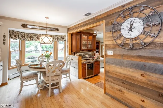 a kitchen with stainless steel appliances granite countertop a stove and a refrigerator