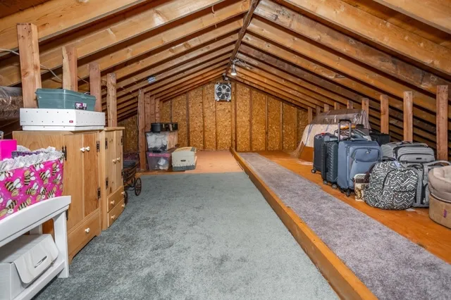 a view of a livingroom with furniture and wooden floor