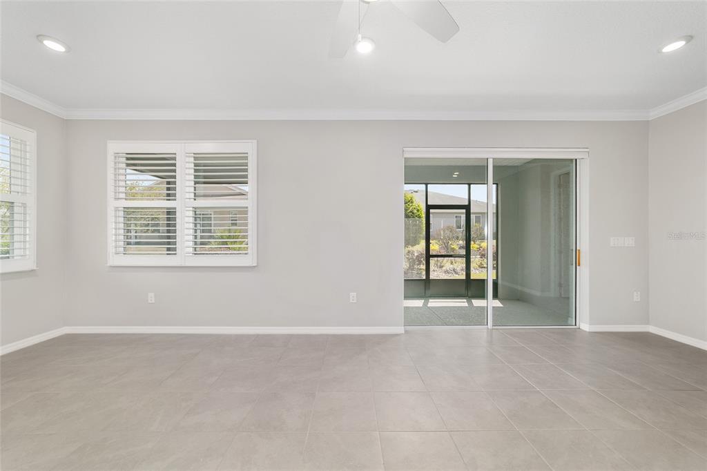 10064 Southwest 88th Street Ocala, FL 34481 - Photo 14 of 47 an empty room with windows
