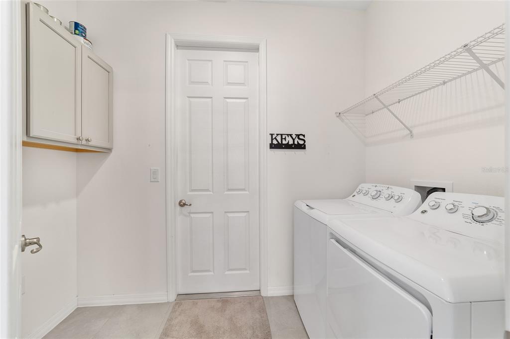 10064 Southwest 88th Street Ocala, FL 34481 - Photo 35 of 47 a utility room with dryer and washer