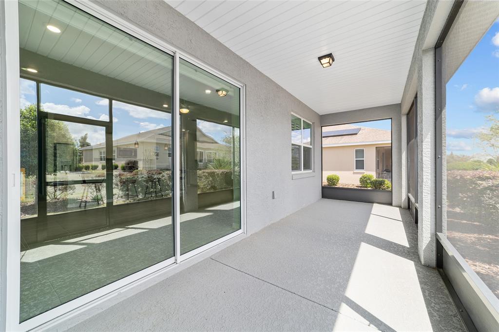 10064 Southwest 88th Street Ocala, FL 34481 - Photo 38 of 47 a view of a large room with windows