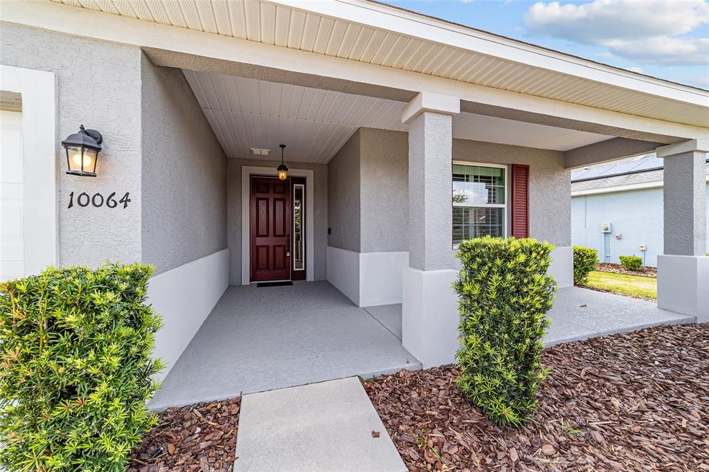 10064 Southwest 88th Street Ocala, FL 34481 - Photo 7 of 47 a view of entryway front of house