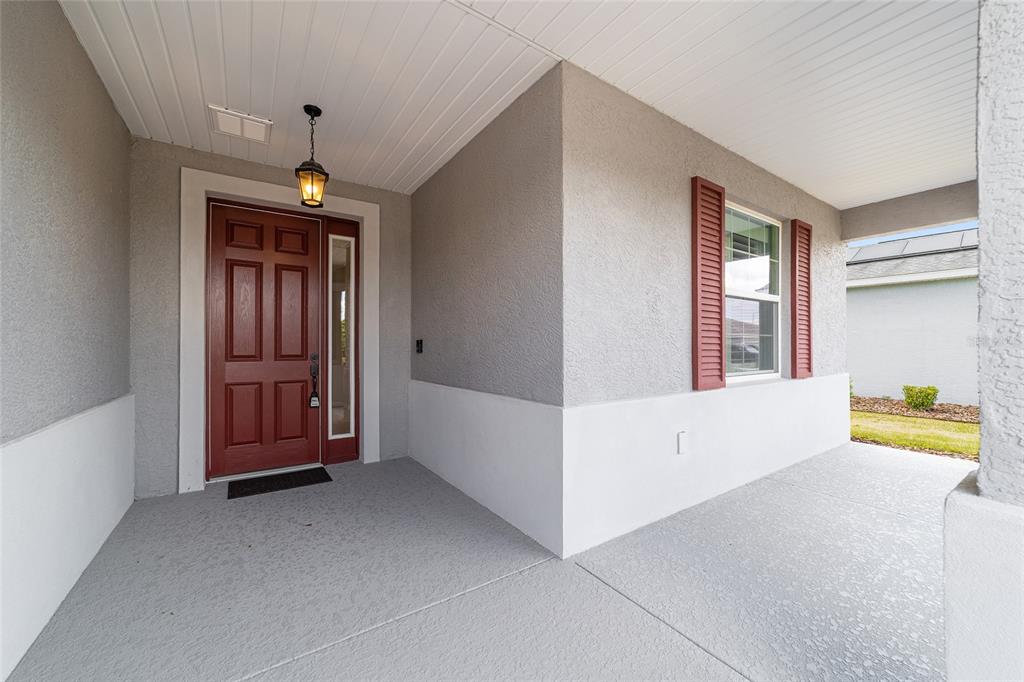 10064 Southwest 88th Street Ocala, FL 34481 - Photo 8 of 47 a view of an empty room with a window