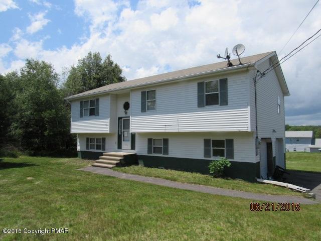 238 Ryan Road Blakeslee, PA 18610 - Photo 2 of 3 a front view of a house with a yard