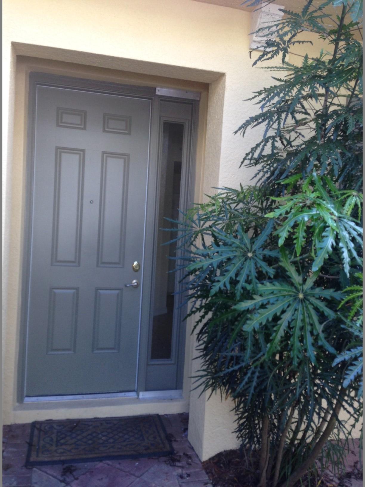 2775 Ravella Way Palm Beach Gardens, FL 33410 - Photo 10 of 17 front door