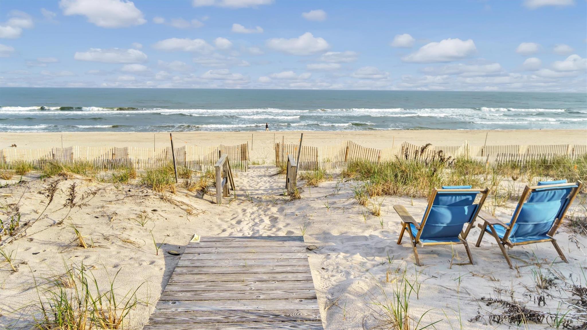 234 Dune Road Quogue, NY 11959 - Photo 2 of 34 a view of a terrace with city view