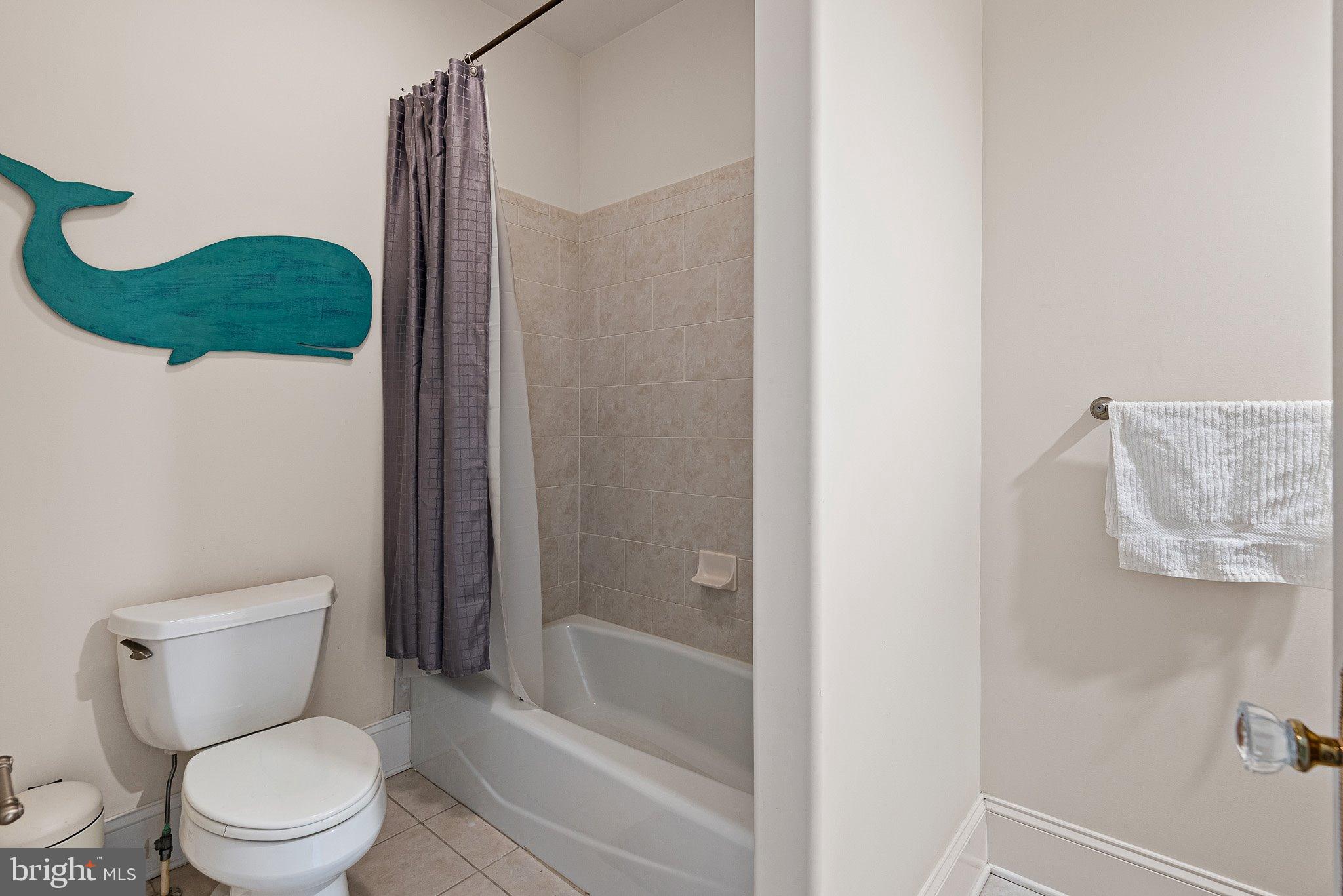 104 Timber Ridge Lane Chadds Ford, PA 19317 - Photo 39 of 65 a white toilet sitting next to a bathtub