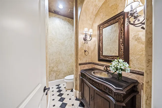 a bathroom with a sink a mirror and a shower