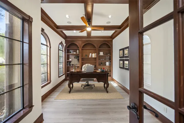 a view of living room with furniture and wooden floor