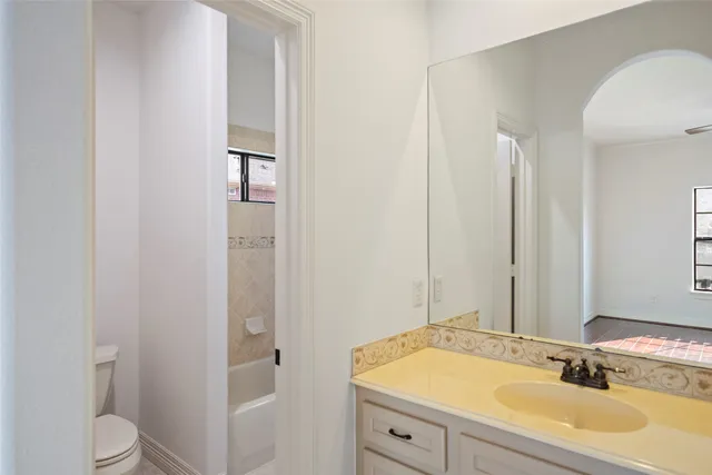 a bathroom with a sink and a toilet