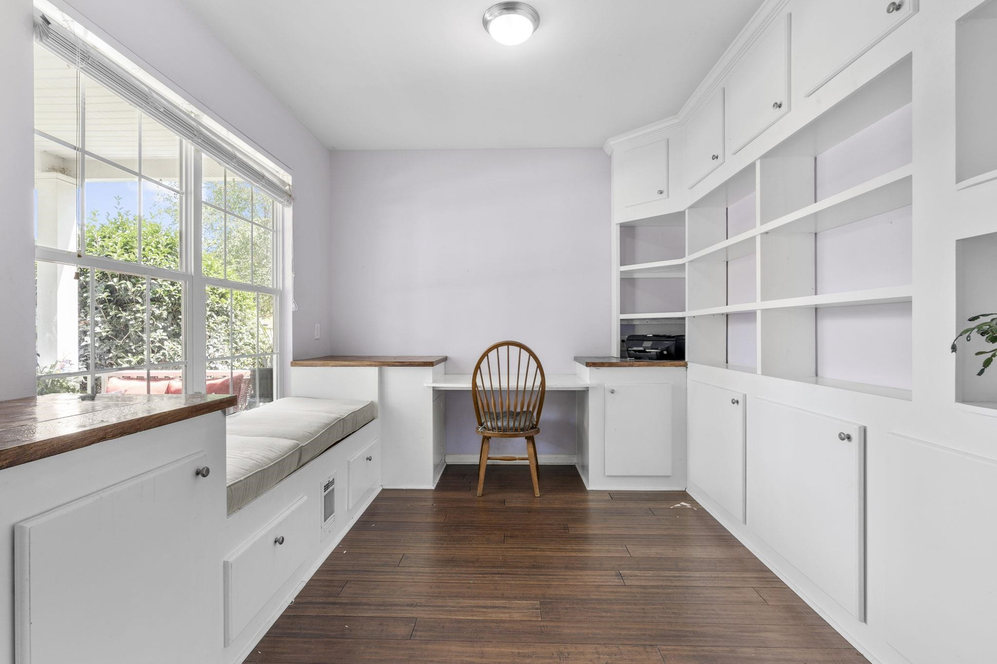 Home Office with Built-In Desk and Shelving