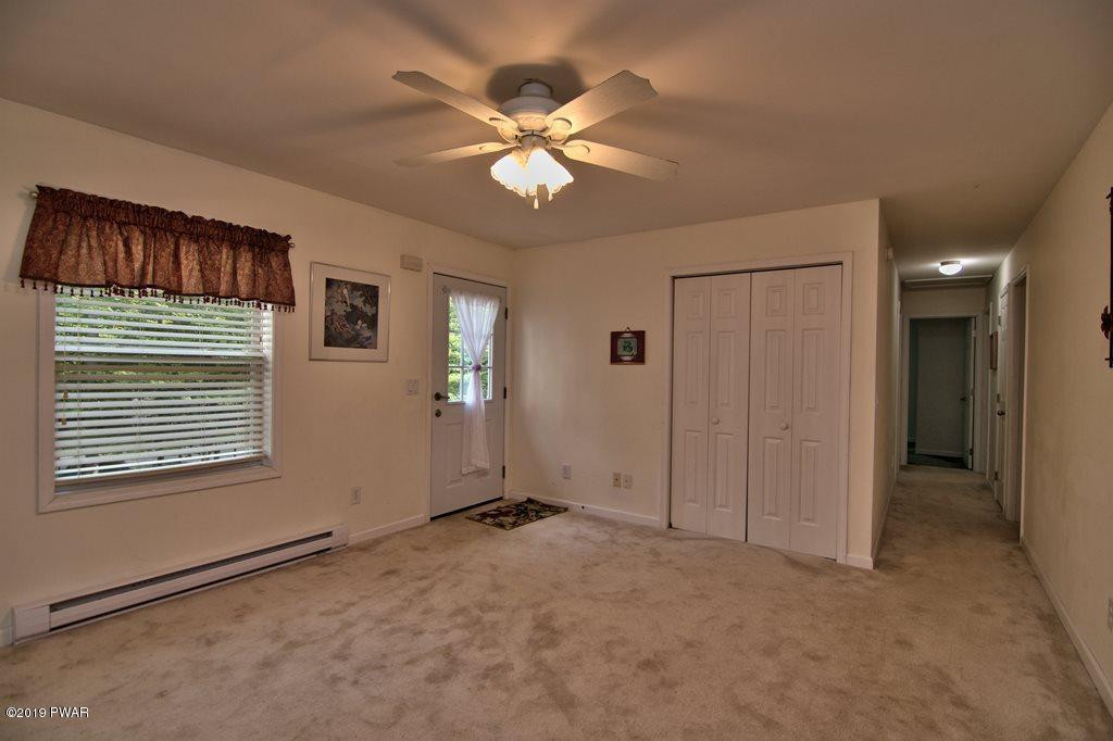 4337 Wedge Road Lake Ariel, PA 18436 - Photo 13 of 48 Living room Front door
