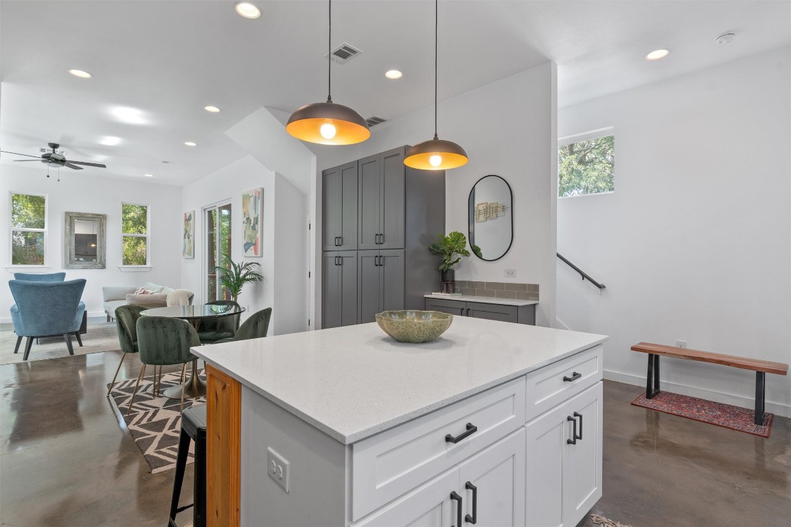 2411 East 11th Street, Unit 1 Austin, TX 78702 - Photo 17 of 17 a kitchen with a table and chairs in it