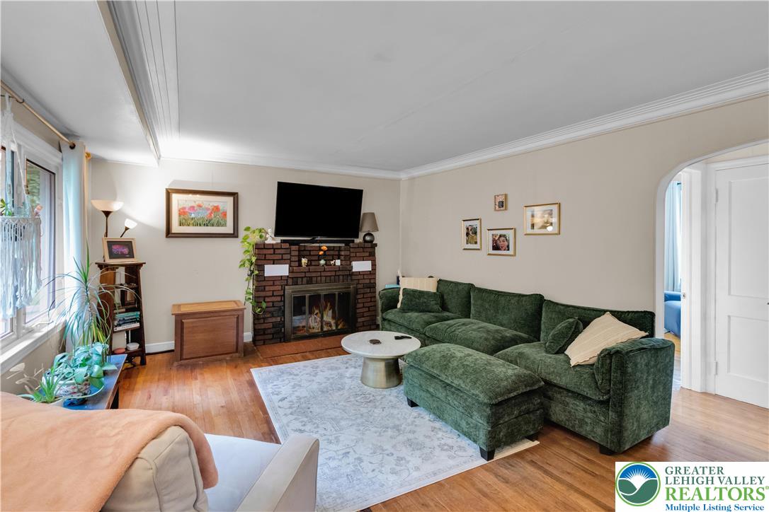 2242 Church Road Bethlehem, PA 18015 - Photo 13 of 74 a living room with furniture and a flat screen tv