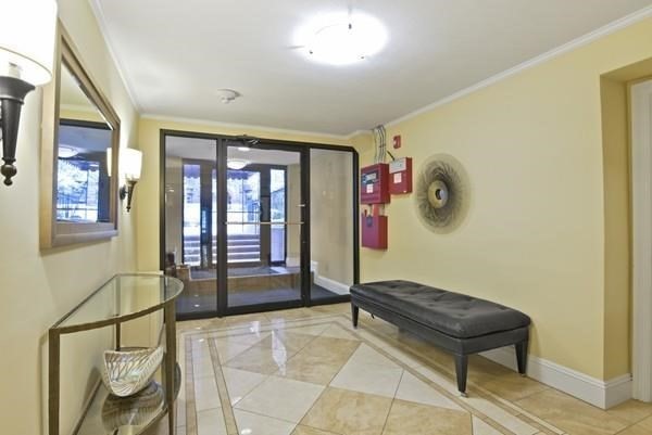 242 Beacon Street, Unit 1 Boston, MA 02116 - Photo 25 of 29 a living room with furniture and a window
