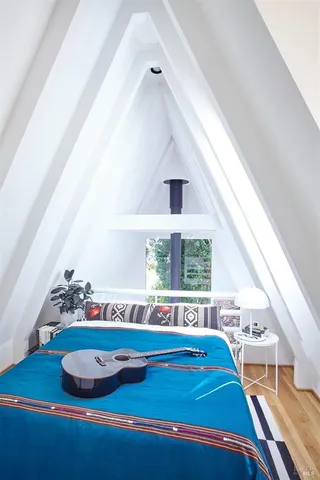a room with window and furniture