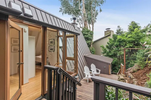 a view of a house with a iron stairs