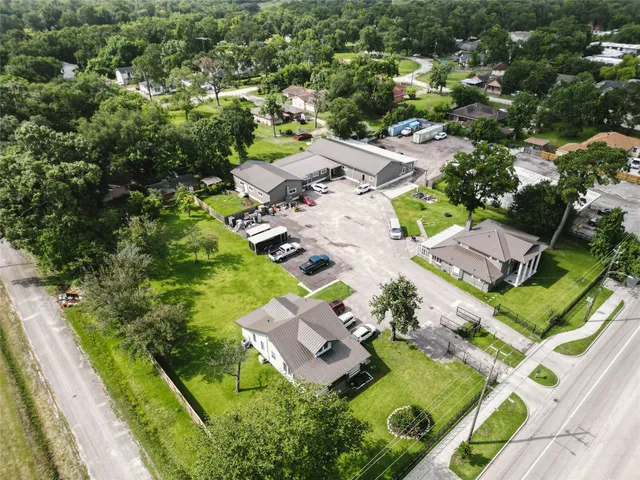 an aerial view of residential house with outdoor space