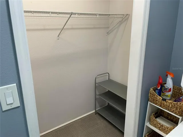 a view of a chairs and table in the patio