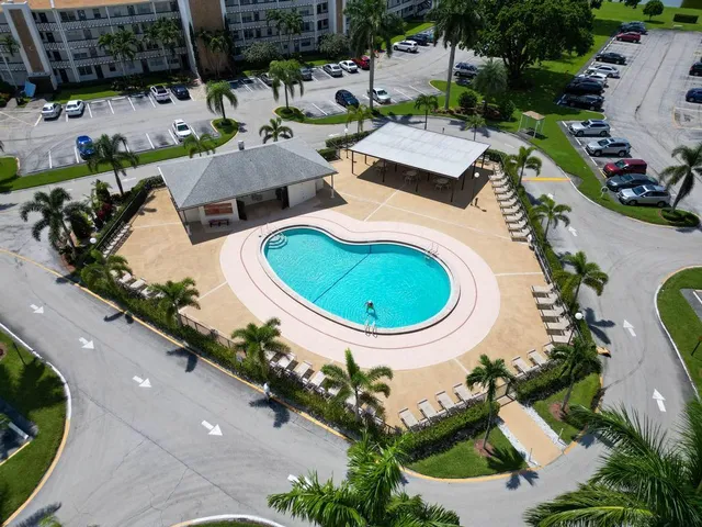 a view of multiple houses with a lake view