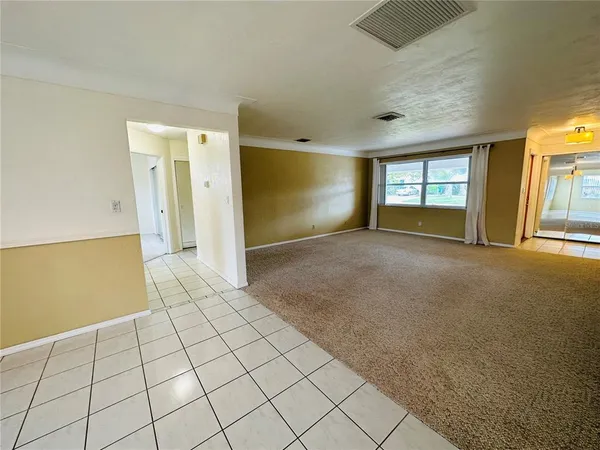 en empty room with windows