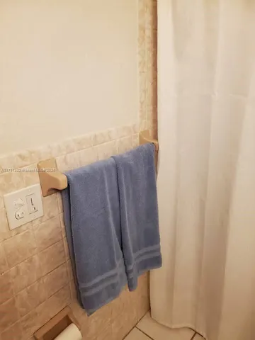 a view of outdoor space with dryer and washer