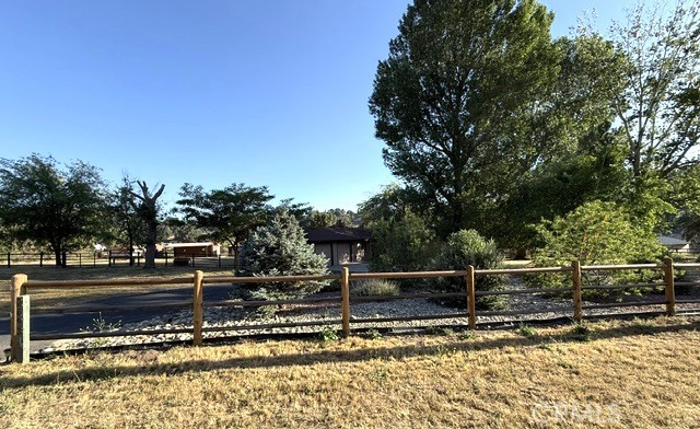 26931 Columbia Way Tehachapi, CA 93561 - Photo 3 of 49 Fully fenced front yard and back yard.