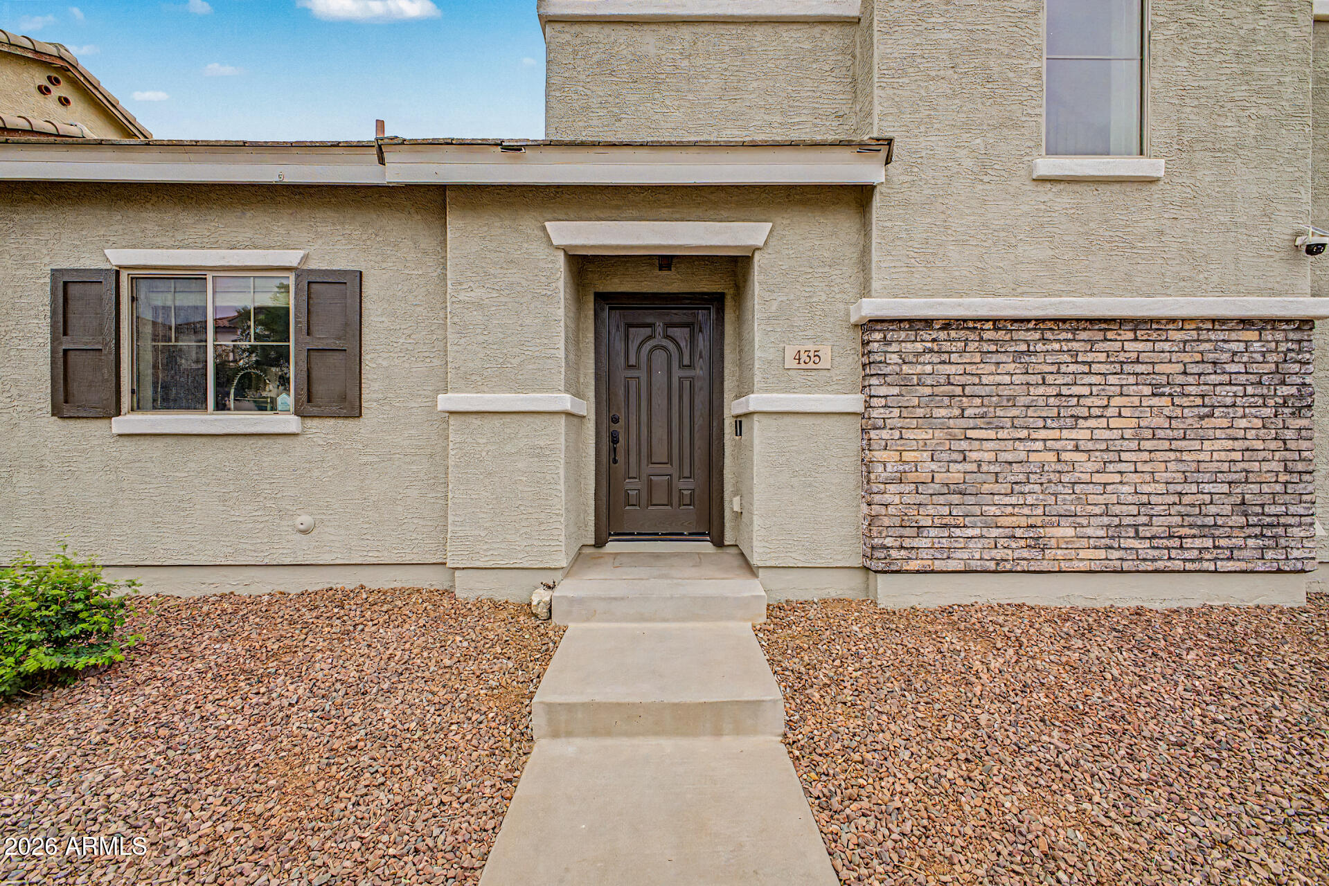 435 North Ranger Trail Gilbert, AZ 85234 - Photo 2 of 20 a front view of a house with a door